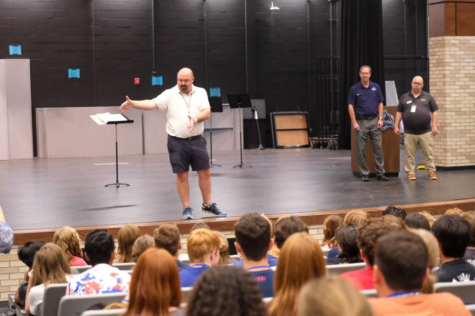 Heath Nall, band director, addresses members of the winning honor band group Monday at West Plains High School in Amarillo.
