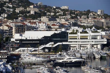 A general view shows the Festival Palace and the Port of Cannes on the eve of the opening of the 67th Cannes Film Festival in Cannes May 13, 2014. REUTERS/Benoit Tessier