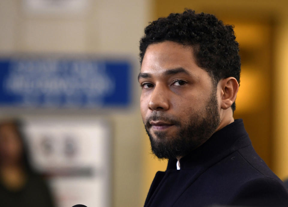 FILE - In this March 26, 2019, file photo, actor Jussie Smollett talks to the media before leaving Cook County Court after his charges were dropped, in Chicago. The latest twist in the Jussie Smollett saga is the revelation of a possible conflict of interest by the special prosecutor investigating why prosecutors dropped charges accusing the actor of staging a racist, homophobic attack on himself. Dan Webb disclosed this week he once co-hosted a political fundraiser for a figure central to his investigation, Cook County State's Attorney Kim Foxx. A Cook County judge must now decide if bias or the appearance of bias renders Webb's position untenable. (AP Photo/Paul Beaty, File)