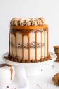 <p>The caramel buttercream frosting on this cake is so delicious, you'll be eating it straight from the mixing bowl. You might as well make a double recipe—just to ensure you have enough for all your guests.</p><p><strong>Get the recipe at <a href="https://livforcake.com/caramel-gingerbread-cake/" rel="nofollow noopener" target="_blank" data-ylk="slk:Liv for Cake" class="link ">Liv for Cake</a>.</strong> </p>