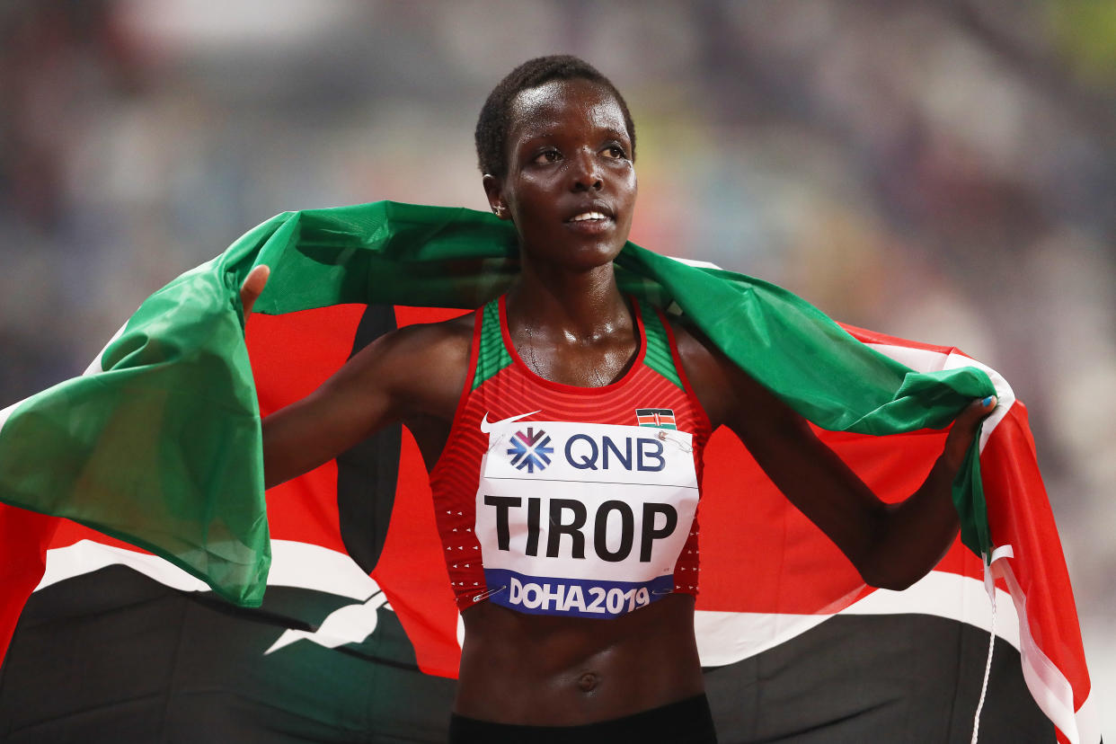 DOHA, QATAR - SEPTEMBER 28:  Agnes Jebet Tirop of Kenya celebrates winning bronze in the Women's 10,000 Metres final during day two of 17th IAAF World Athletics Championships Doha 2019 at Khalifa International Stadium on September 28, 2019 in Doha, Qatar. (Photo by Alexander Hassenstein/Getty Images for IAAF)