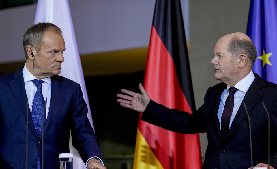 German Chancellor Olaf Scholz, right, and Poland's Prime Minister Donald Tusk attend a press conference in Berlin, Germany, Monday, Feb.12, 2024. (AP Photo/Ebrahim Noroozi)