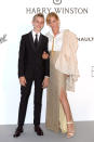 <p>Uma Thurman also hit up the amfAR Gala with a younger man on her arm: Her 15-year-old son, Levon Roan Thurman-Hawke. The <em>Kill Bill</em> actress dazzled in a gold skirt and white button-down shirt, while Levon (her son with ex-husband Ethan Hawke) looked handsome in his black suit. The kid’s got good genes! (Photo: Dominique Charriau/WireImage) </p>