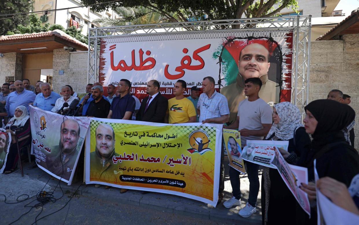 Palestinians rally in support of Mohammed Halabi, the Gaza director of World Vision - Mohammed Abed/AFP via Getty Images