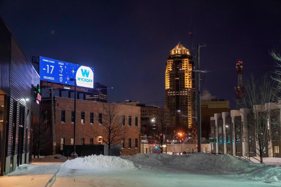 A billboard in downtown Des Moines lists the temperature as minus 17 degrees Jan. 14, 2024.