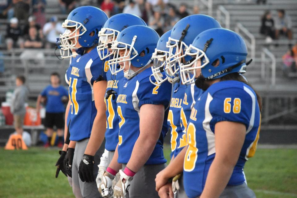 Mitchell's 2021 seniors stand at midfield during the coin toss ahead of their game against Paoli. The 2022 Bluejackets will be unveiled Friday night in the IHSAA-controlled scrimmage at Bedford North Lawrence.
(Photo: Auston Matricardi)