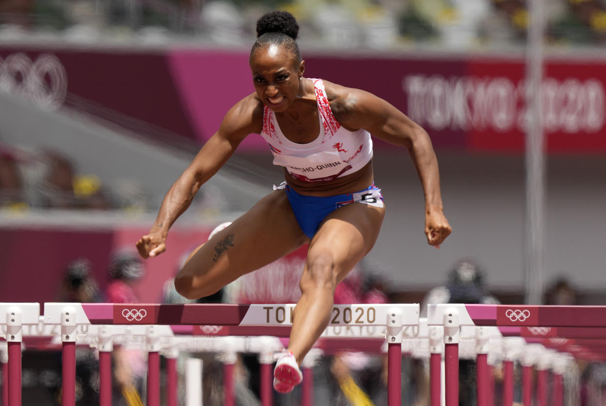 FILE - Jasmine Camacho-Quinn, of Puerto Rico, clears the final hurdle to win gold in the women's 100-meters hurdles final at the 2020 Summer Olympics, Monday, Aug. 2, 2021, in Tokyo, Japan. The title of Olympic hurdles champion carries a lot of weight for Camacho-Quinn after becoming Puerto Rico's first champion in track and field at the Tokyo Games. (AP Photo/Martin Meissner, File)