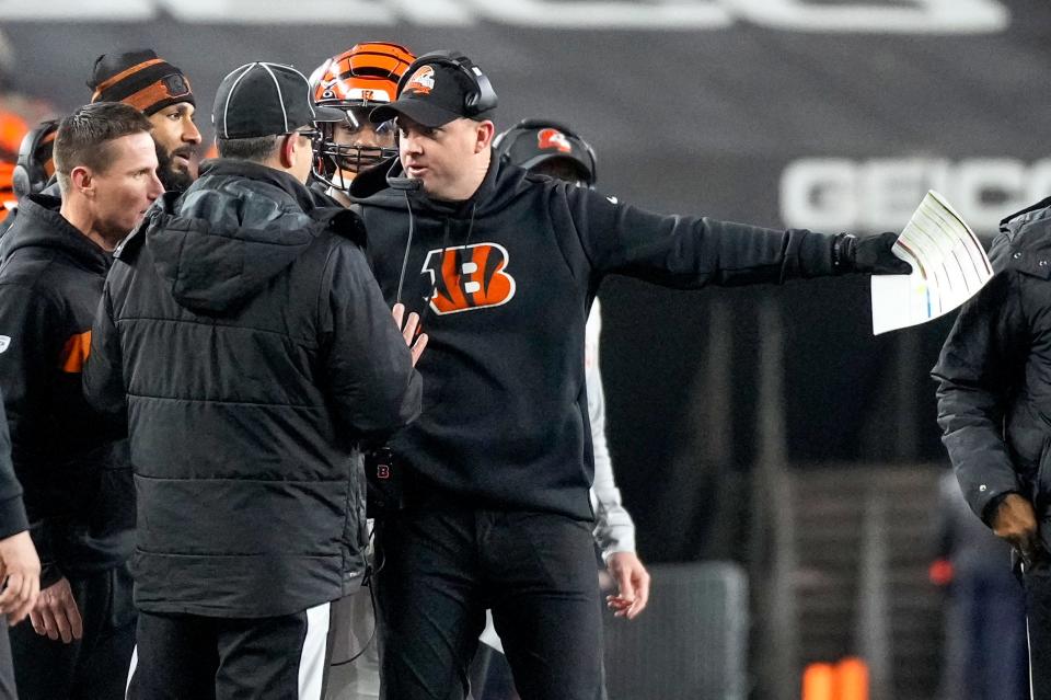 Cincinnati Bengals head coach Zac Taylor appeals to the sideline referee for a penalty against the Ravens in the first quarter during an NFL wild-card playoff football game between the Baltimore Ravens and the Cincinnati Bengals, Sunday, Jan. 15, 2023, at Paycor Stadium in Cincinnati.The Ravens led 10-9 at halftime.