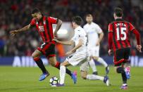 <p>AFC Bournemouth’s Joshua King, left, and Swansea City’s Jack Cork battle for the ball during the English Premier League soccer match at the Vitality Stadium </p>