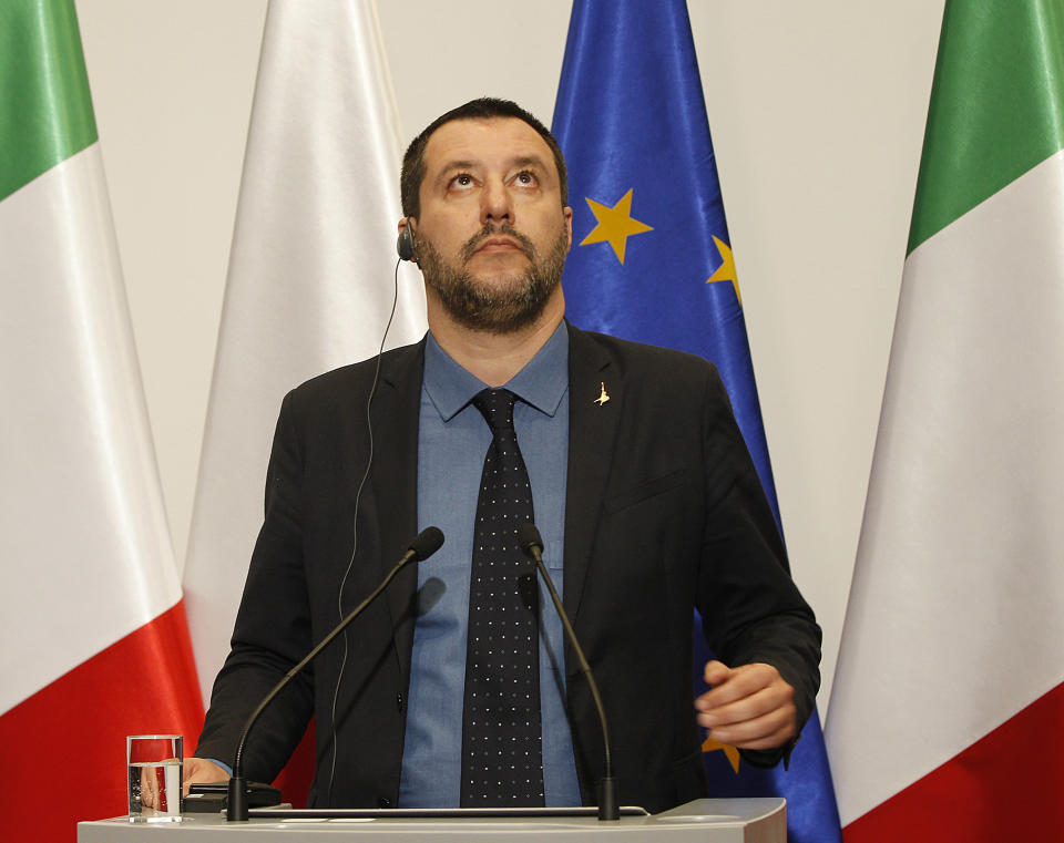 Italian Interior Minister Matteo Salvini look up during a joint press conference with his Polish counterpart Joachim Brudzinski following their talks in Warsaw, Poland, Wednesday, Jan. 9, 2019. Salvini's visit is seen as sounding out a possible alliance with Poland's ruling EU-skeptic party ahead of spring elections for the European Parliament. (AP Photo/Czarek Sokolowski)
