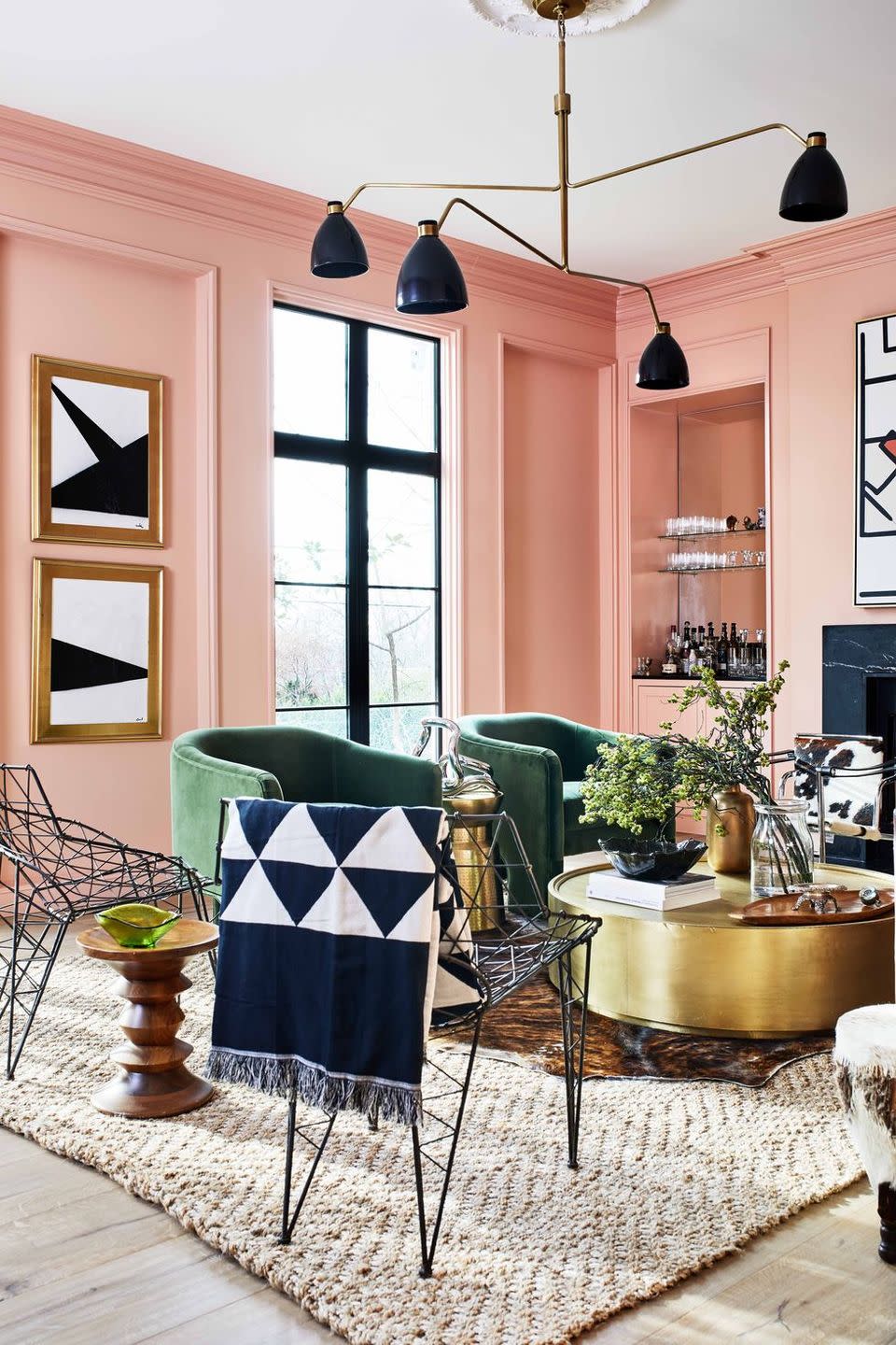 <p>Peach walls breathe life into this <a href="https://www.elledecor.com/design-decorate/house-interiors/a29766125/carmel-greer-washington-dc-house-tour/" rel="nofollow noopener" target="_blank" data-ylk="slk:Washington, DC, living room;elm:context_link;itc:0;sec:content-canvas" class="link ">Washington, DC, living room</a> designed by architect Carmel Greer. <br></p>