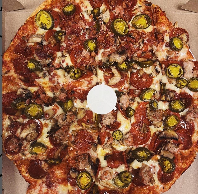 A pie including pepperoni and jalapenos from Tommy's Pizza in Upper Arlington.
