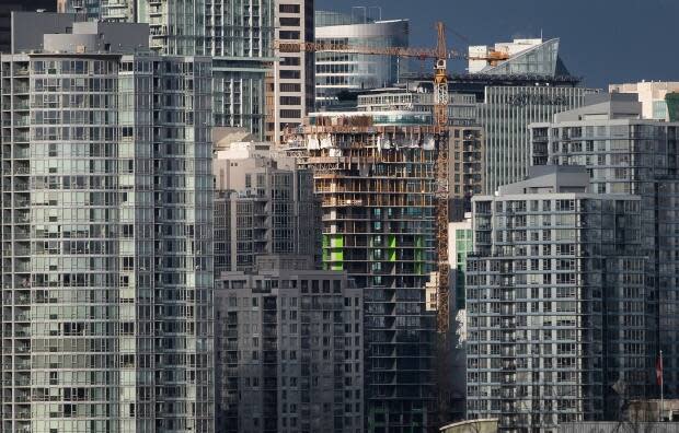 A condo tower under construction is pictured in downtown Vancouver in February 2020.