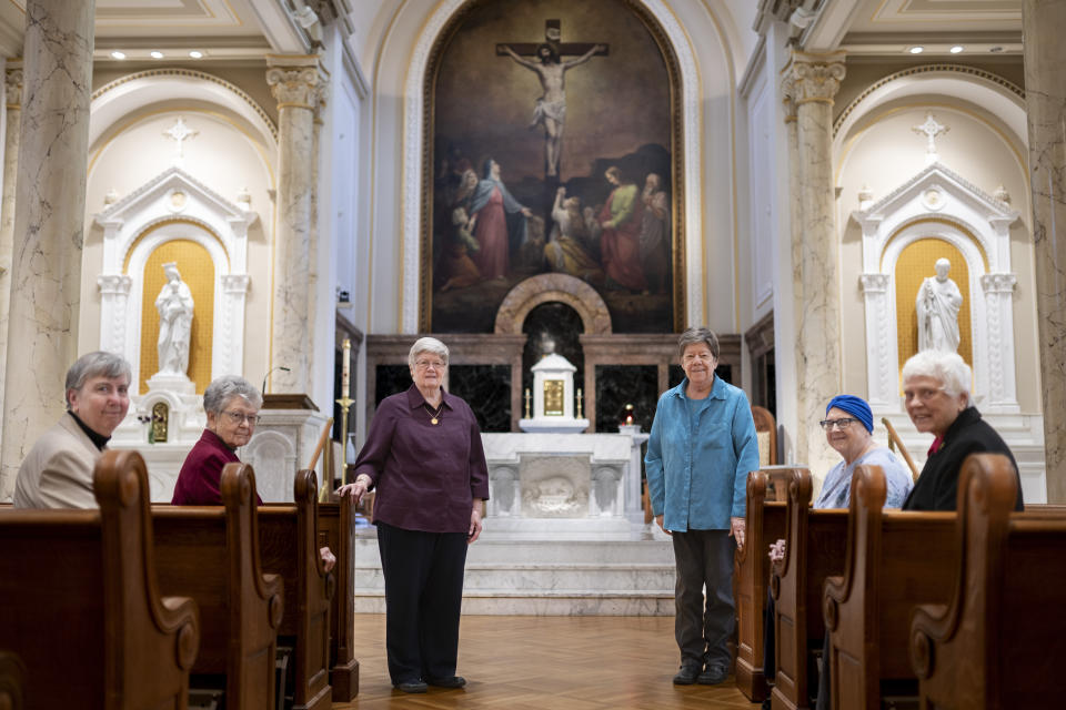 From left, Sisters Margaret M. O'Brien, Margaret Egan, Dorothy Metz, Donna Dodge, Claire E. Regan, and Sheila Brosnan, all members of the leadership council of the Sisters of Charity, pose for a photograph inside the Chapel of the Immaculate Conception where they took their vows at various times, at the College of Mount Saint Vincent, a private Catholic college in the Bronx borough of New York, on Tuesday, May 2, 2023. In more than 200 years of service, the Sisters of Charity of New York have cared for orphans, taught children, nursed the Civil War wounded and joined Civil Rights demonstrations. Last week, the Catholic nuns decided that it will no longer accept new members in the United States and will accept the "path of completion." (AP Photo/John Minchillo)