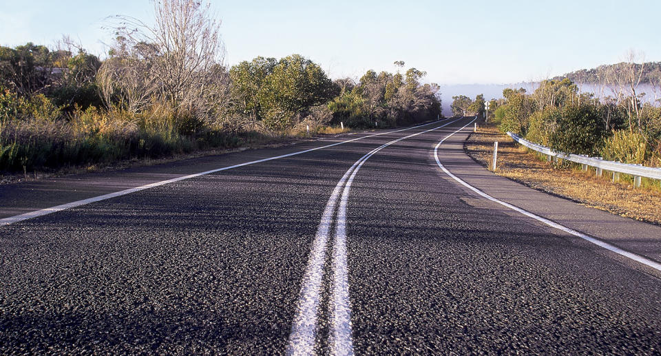 Drivers in NSW, WA and the NT are allowed to break a solid double line to enter or exit their property. Image: Getty