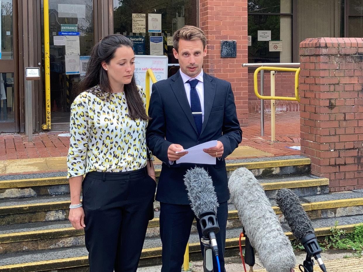 Tom and Sarah Richford read a statement outside Folkestone Magistrates' Court (PA)