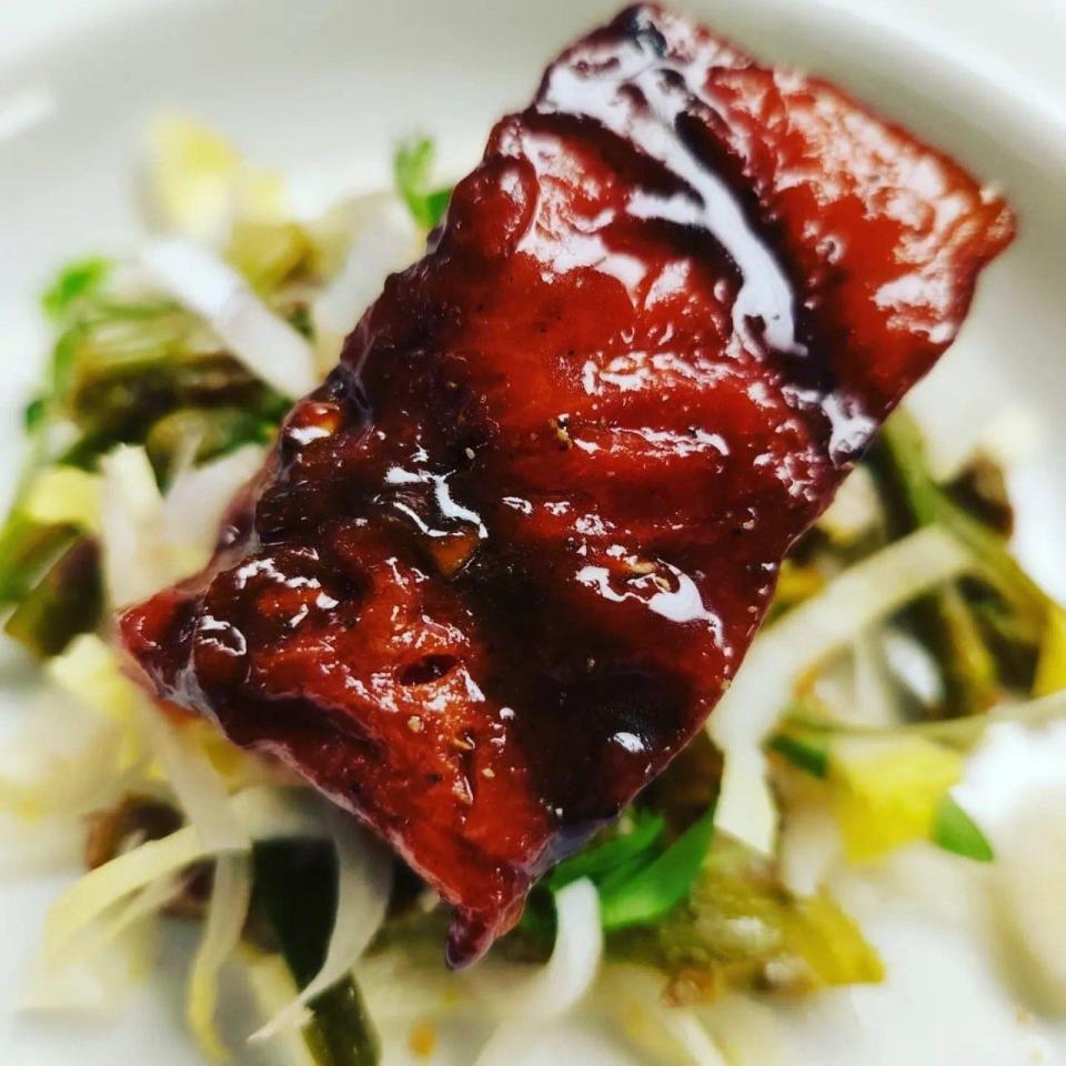 Charred watermelon steak on endive, one of the recent dishes created by Lansing resident and chef Kari Magee. Magee is partnering with Shawn Elliott to open Veg Head, a vegan restaurant, in downtown Lansing.