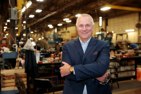 Bob Roth, CEO of transformer manufacturer RoMan Manufacturing poses for a photograph in his plant in Grand Rapids, Michigan, U.S. December 12, 2018. Picture taken December 12, 2018. REUTERS/Rebecca Cook