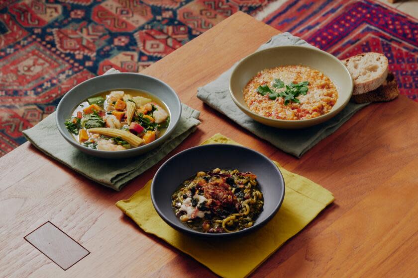 Dishes and cooking of soup in Michelle Huneven's kitchen.