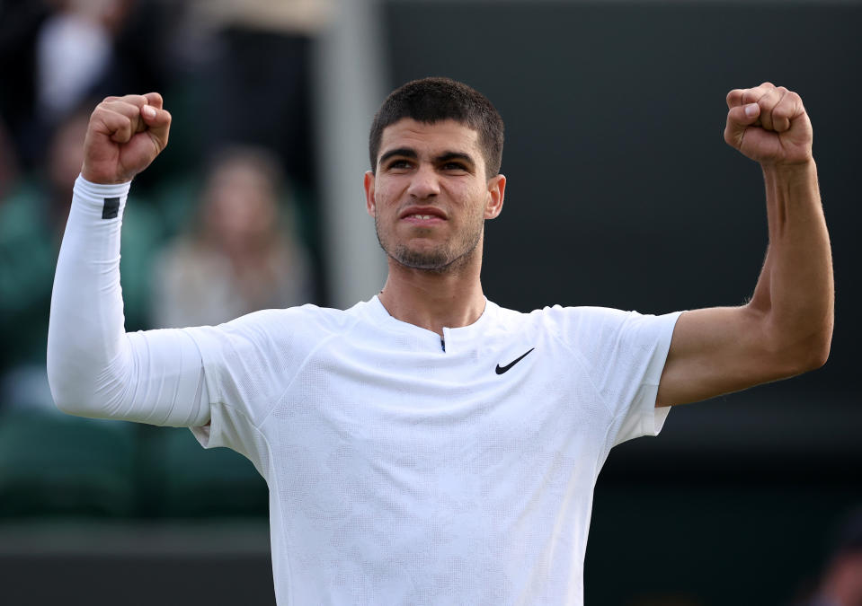 LONDON, ENGLAND - JUNE 29: Carlos Alcaraz of Spain celebrates winning against Tallon Griekspoor of Netherlands during their Men's Singles Second Round match on day three of The Championships Wimbledon 2022 at All England Lawn Tennis and Croquet Club on June 29, 2022 in London, England. (Photo by Ryan Pierse/Getty Images)