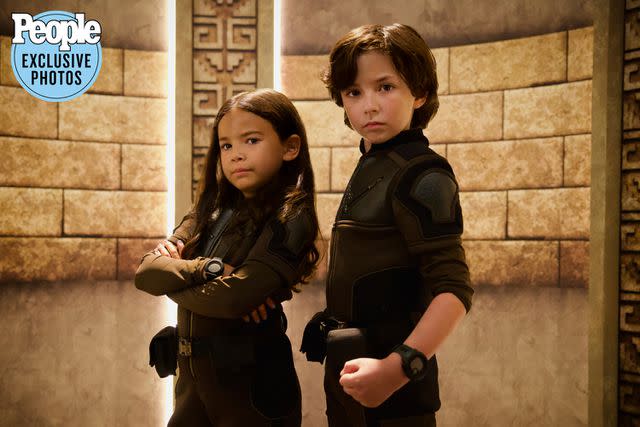 <p>Courtesy of Netflix</p> Everly Carganilla and Connor Esterson in Netflix's <em>Spy Kids: Armageddon</em> (2023)