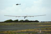 The Solar Impulse 2, a solar powered airplane, piloted by Andre Borschberg, lands at Kalaeloa Airport, Hawaii, on July 3, 2015