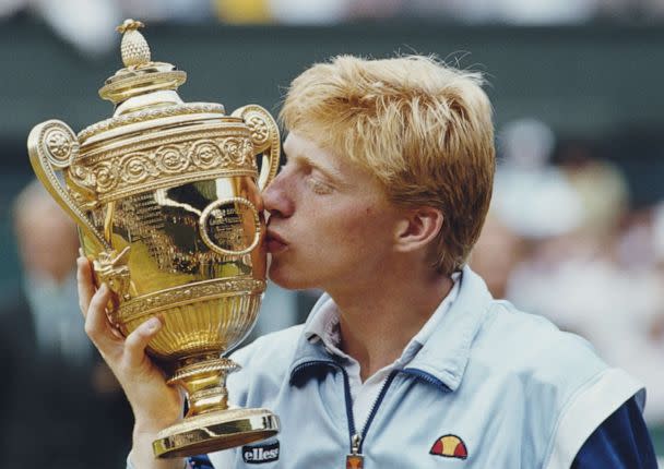 PHOTO: Boris Becker of Germany kisses the trophy to celebrate his victory over Kevin Curren in the Men's Singles final at the Wimbledon Lawn Tennis Championship on July 7, 1985, in London. (Steve Powell/Getty Images)