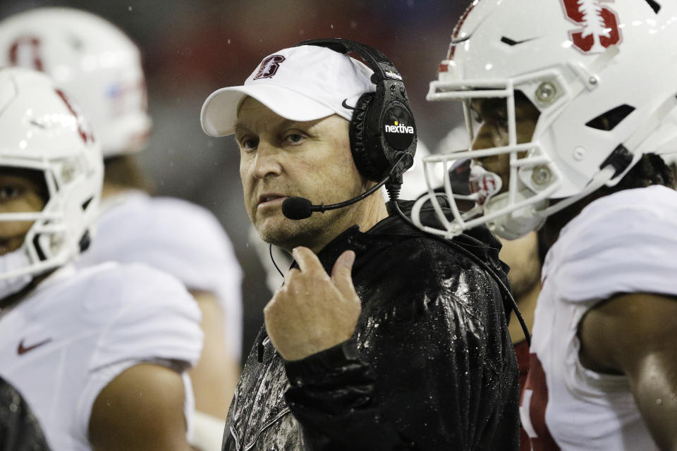 Stanford head coach Troy Taylor, center, stands with his players during a break in play in the first half of an NCAA college football game against Washington State, Saturday, Nov. 4, 2023, in Pullman, Wash. (AP Photo/Young Kwak)