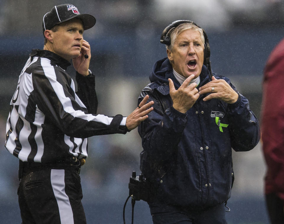 Seattle Seahawks head coach Pete Carroll, tight, yells at referees during an NFL football game against the Baltimore Ravens, Sunday, Oct. 20, 2019 in Seattle, Wash. (Olivia Vanni /The Herald via AP)