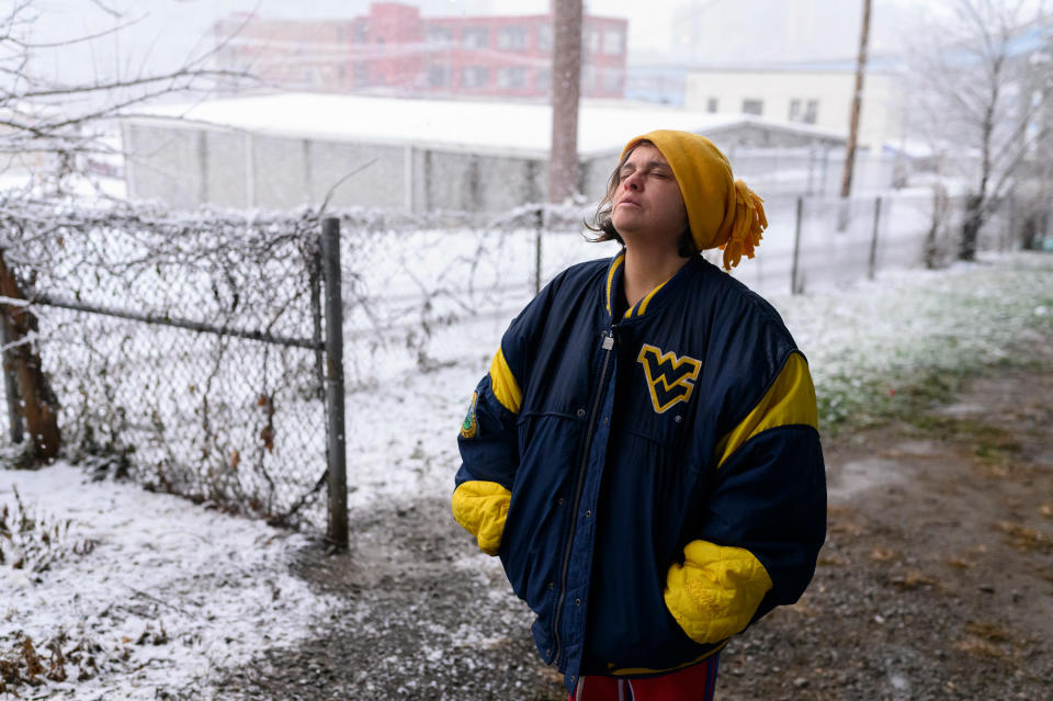 Chrissy at her encampment under a highway overpass during the first snowstorm of the year, in December.<span class="copyright">Rebecca Kiger</span>