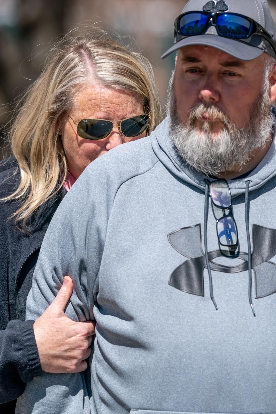 Michelle Strain Whiteid, left, and her husband, Chris Whiteid, speak to the media during a press conference to update the public about the disappearance of University of Missouri student Riley Strain at Public Square Park in Nashville, Tenn., Tuesday, March 19, 2024.