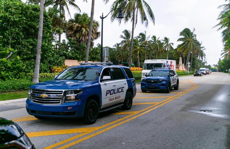 Palm Beach Police are seen near the entrance of former President Donald Trump’s Mar-a-Lago home on Tuesday, Aug. 9, 2022, in Palm Beach, Florida. The FBI conducted a search of Trump’s Mar-a-Lago estate on Monday.