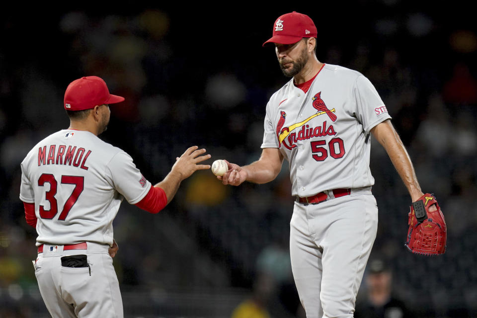 St. Louis Cardinals manager Oliver Marmol takes starting pitcher Adam Wainwright out of the game against the Pittsburgh Pirates in the fifth inning of a baseball game in Pittsburgh, Tuesday, Aug. 22, 2023. (AP Photo/Matt Freed)