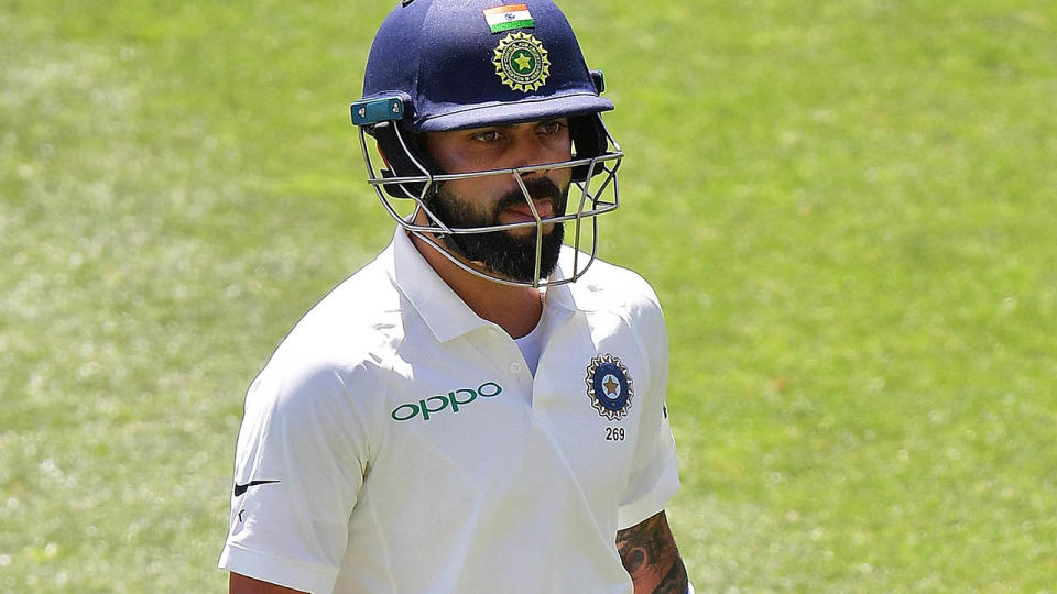 Virat Kohli of India walks from the field after being caught by Usman Khawaja. (Photo by Daniel Kalisz – CA/Cricket Australia/Getty Images)