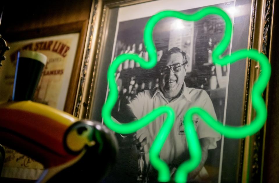 A photo of Jimmy Spears' father, Joe, hangs behind the bar at Jimmy's Bar on Farmington Road in West Peoria. Joe was a popular bartender and regular customer at Jimmy's Bar until his death in 2005.