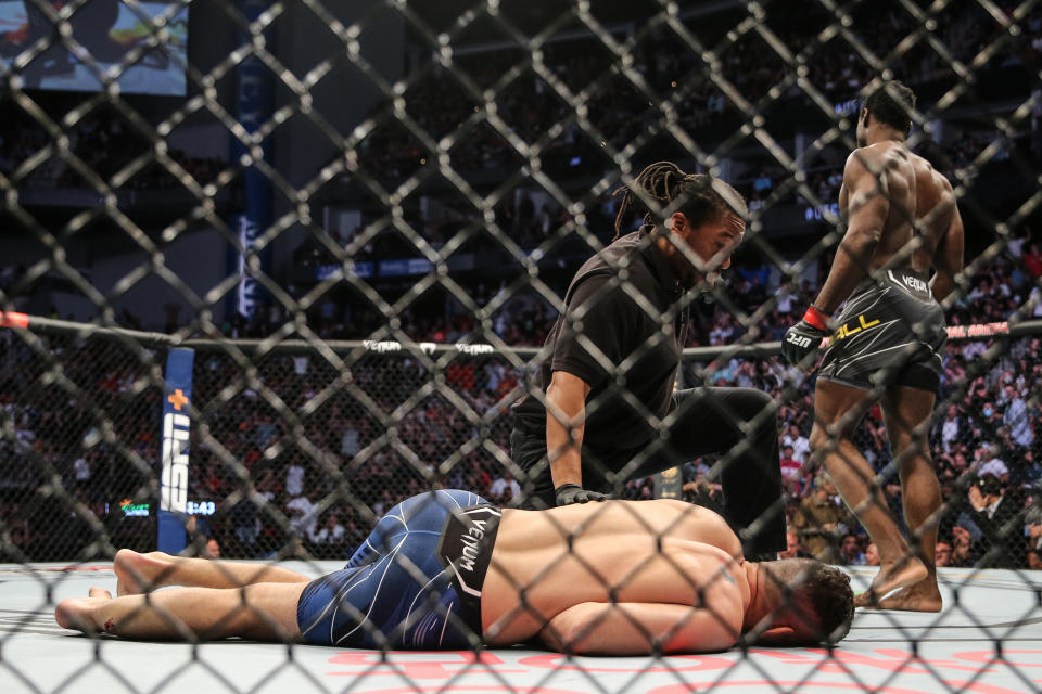 JACKSONVILLE, FL - APRIL 24: Chris Weidman of the United States breaks his leg on a kick attempt on Uriah Hall of Jamaica  during UFC 261 at VyStar Veterans Memorial Arena on April 24, 2021 in Jacksonville, Florida.  (Photo by Alex Menendez/Getty Images)