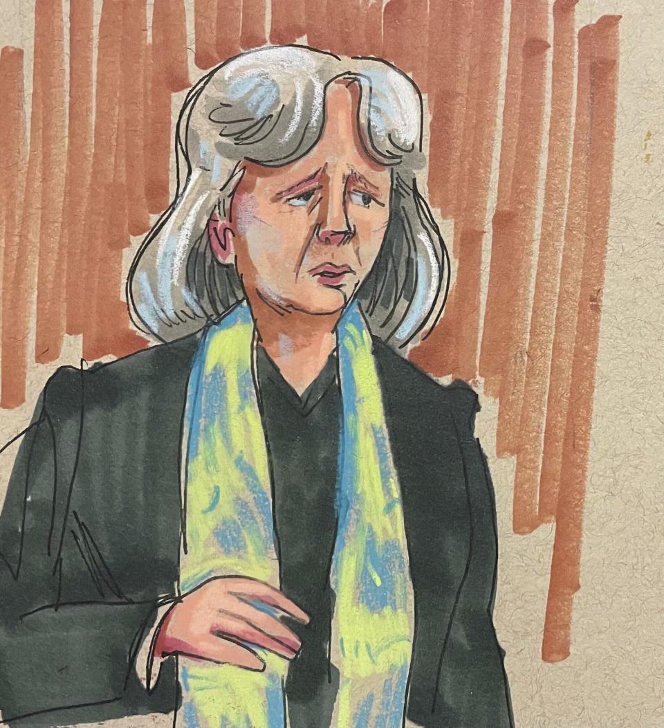 In this courtroom sketch, defense attorney Judy Clarke delivers her opening statement in the federal trial for Robert Bowers, the suspect in the 2018 synagogue massacre, on Tuesday, May 30, 2023, in Pittsburgh. Bowers could face the death penalty if convicted of some of the 63 counts he faces in the shootings, which claimed the lives of worshippers from three congregations who were sharing the building, Dor Hadash, New Light and Tree of Life. (David Klug via AP)