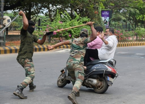Hundreds have been injured in India during clashes between protesters and riot police wielding bamboo canes, or 'lathis'