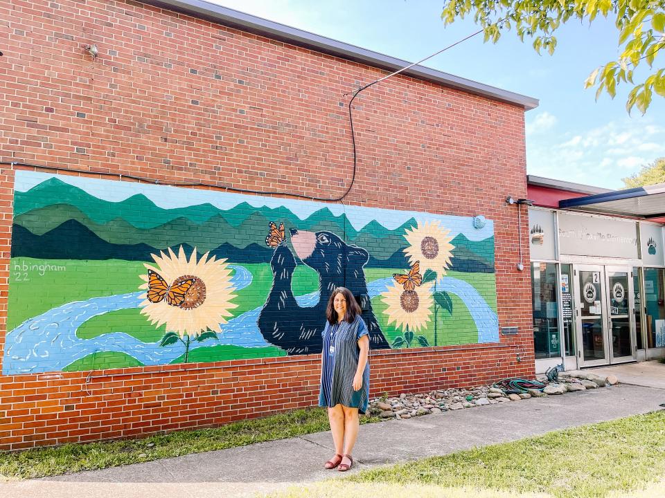 Dr. Tanna Nicely, principal at South Knoxville Elementary School, in front of the new mural on Aug. 9, 2022.