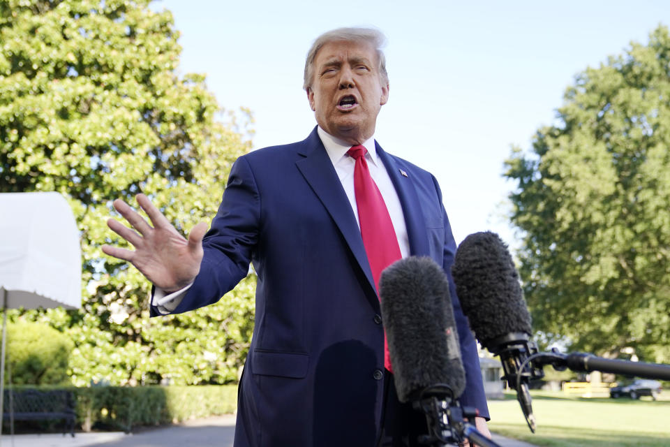 President Donald Trump speaks with reporters on the South Lawn of the White House, Saturday, Sept. 19, 2020, in Washington, before departing for a campaign rally in North Carolina. (AP Photo/Patrick Semansky)