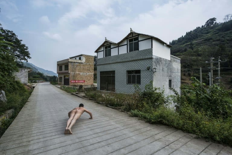 Ou Zhihang was detained after taking nude photographs in Bije, Guizhou where four children drank pesticide after being abandoned