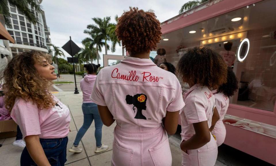 A team of Rosettes from Camille Rose beauty products prepare to meet customers in front of Ulta Beauty Store 10001 Flagler St., Miami, Wednesday, November 29, 2023.