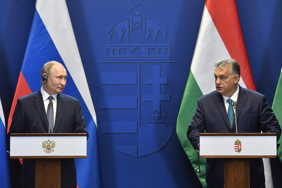 Hungarian Prime Minister Viktor Orban, right, and Russian President Vladimir Putin hold a joint press conference following their talks at the PM's office in the Castle of Buda in Budapest, Hungary, Wednesday, Oct. 30, 2019. (Zoltan Mathe/MTI via AP)