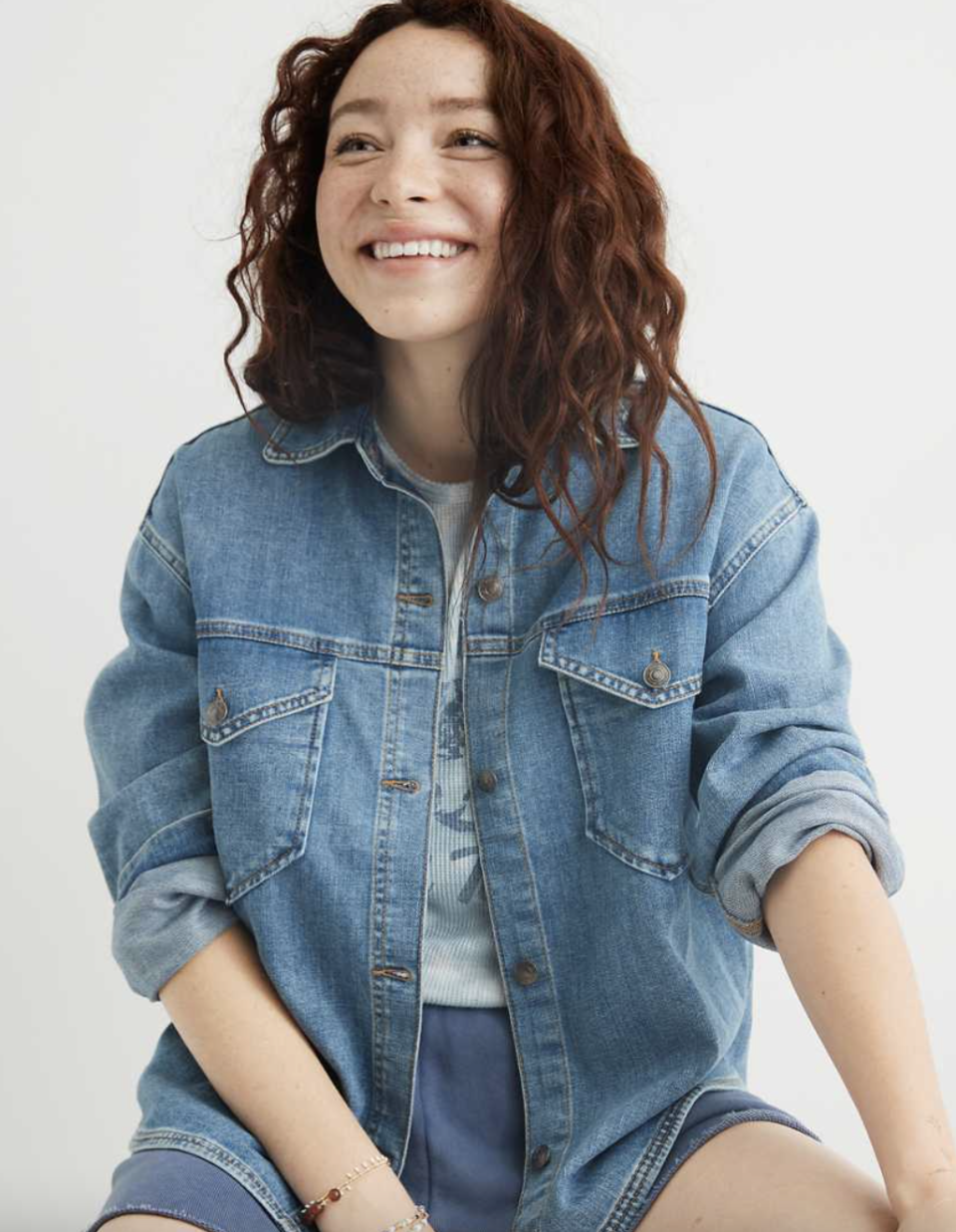 red head model wearing Aerie Denim Shacket american eagle