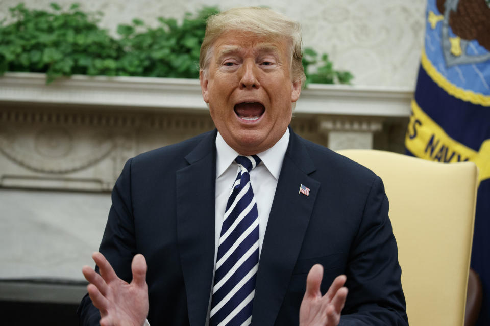 President Trump speaks to reporters at the White House on Tuesday. (Photo: Evan Vucci/AP)