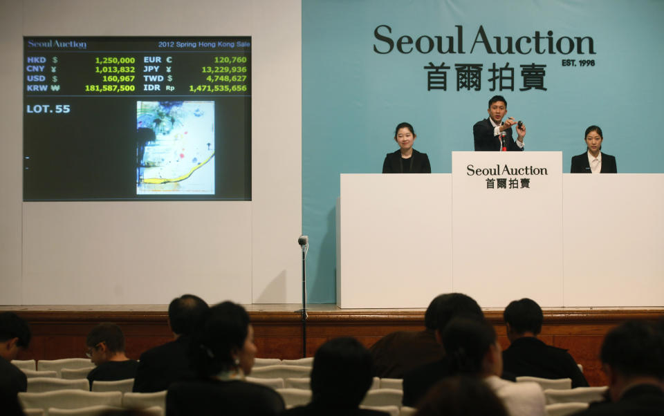 Julian Schnabel's "Untitled" is displayed for sale at the Seoul Auction in Hong Kong Tuesday, April 3, 2012. Auctioneers in Hong Kong have sold 10 paintings seized from a South Korean bank that collapsed last year amid a corruption scandal to raise $2.4 million to help repay depositors. The paintings included works by American Schnabel and noted Chinese artists Zeng Fanzhi and Zhang Xiaogang. (AP Photo/Kin Cheung)