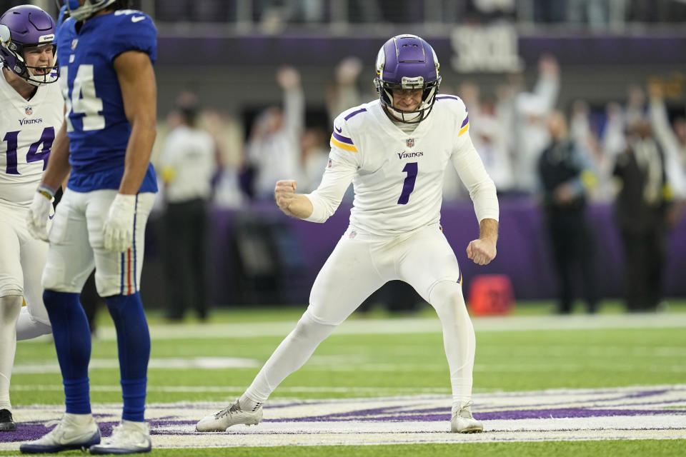 Minnesota Vikings place kicker Greg Joseph celebrates after kicking a 61-yard field goal on the final play of an NFL football game against the New York Giants, Saturday, Dec. 24, 2022, in Minneapolis. The Vikings won 27-24. (AP Photo/Abbie Parr)