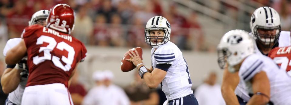 BYU’s quarterback Max Hall looks for an open receiver as BYU and Oklahoma play at Cowboys Stadium in Arlington Texas. Saturday, Sept. 5, 2009. | Scott G. Winterton, Deseret News