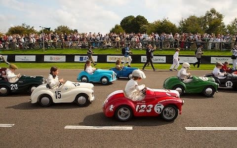 Goodwood Revival - Settrington Cup race for Auston J40 pedal cars - Credit: Michael Cole/Corbis Sport