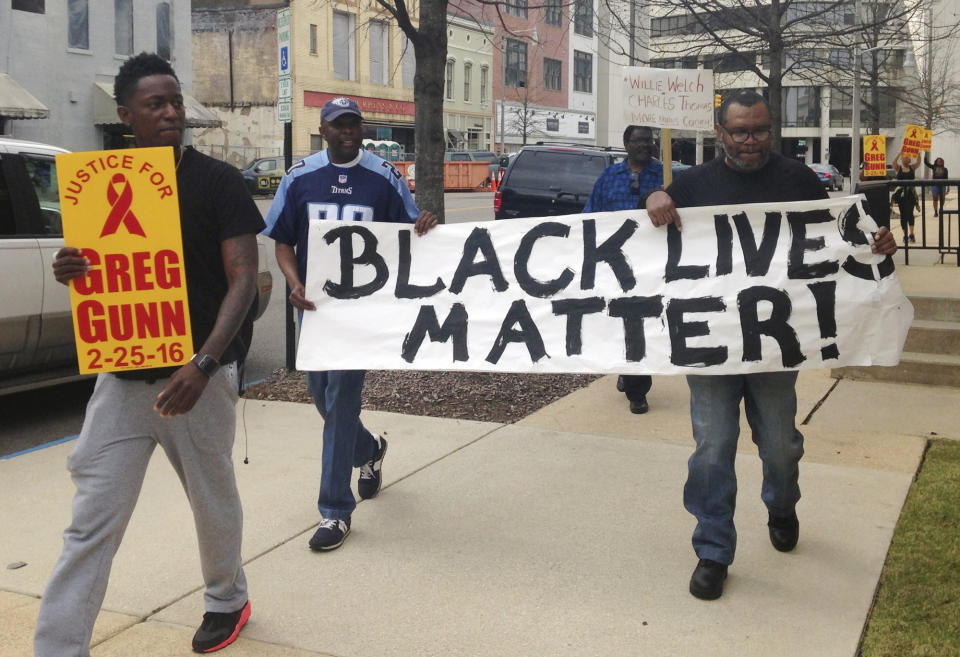 FILE - Protesters demonstrate against the killing of a black man by a white police officer in Montgomery, Ala., on Thursday, March 10, 2016. Officer Aaron Smith is charged with murder in the shooting death of Greg Gunn, but a demonstration leader said city officials are alienating community members in the aftermath of the shooting. (AP Photo/Melissa Brown, File)